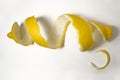 Lemon peel or lemon twist on white background. Close-up. Limon.