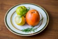 Lemon, persimmon and apple together