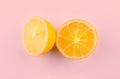 Lemon photo, Ripe half of yellow lemon citrus fruit isolated on PINK background with clipping path
