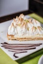 Lemon pie slice in a white plate Royalty Free Stock Photo