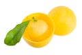 Lemon placed into yellow plastic storage containerr. Isolated over white.