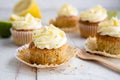 Lemon and poppy seed cupcakes with cheese cream frosting Royalty Free Stock Photo