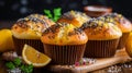 Lemon poppy seed muffins on blurred background with copy space for easy home kitchen recipe concept