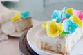 Lemon and poppy seeds loaf cake decorated with pastel fondant flowers Royalty Free Stock Photo