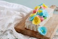 Lemon and poppy seeds loaf cake decorated with pastel fondant flowers Royalty Free Stock Photo