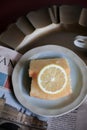 Lemon pound cake on vintage background. Close up slice of citrus pie by classic recipe. Royalty Free Stock Photo