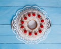 Lemon raspberry cake on blue wood