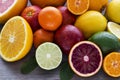 Lemon,red orange, orange, grapefruit, lime, tangerine on old wo