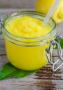 Lemon scrub with sugar, honey and olive oil Royalty Free Stock Photo