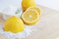 Lemon and sea salt - Beauty treatment with organic cosmetics with lemon ingredients on wood and rosemary background for body scrub Royalty Free Stock Photo