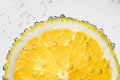 Lemon slice with bubbles Royalty Free Stock Photo