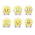 Lemon slice cartoon character with sad expression