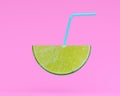 Lemon slice, juice with Straw on pastel pink background. minimal