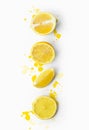 Lemon slices on white background with watercolor splashes; Fruit