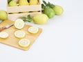 Lemon slide on wooden cutting board