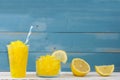 Lemon slushies in glass on rustic wood Royalty Free Stock Photo