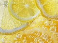 lemon soda water splashing with bubbles close up Royalty Free Stock Photo