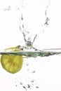 Lemon splashing water Royalty Free Stock Photo