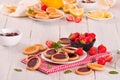 Lemon and straberry tartlets. Royalty Free Stock Photo