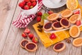 Lemon and straberry tartlets. Royalty Free Stock Photo