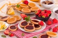 Lemon and straberry tartlets. Royalty Free Stock Photo