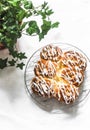 Lemon sugar buns with icing on a light background, top view Royalty Free Stock Photo