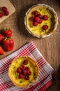 Lemon tart with rosemary and berries Royalty Free Stock Photo