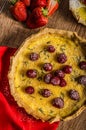 Lemon tart with rosemary and berries Royalty Free Stock Photo