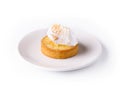 Lemon tartlet with meringue on plate