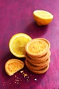 Lemon tartlets on deep pink background