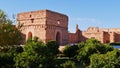 Lemon trees in the courtyard of El Badi Palace with loam constructions in the historic center (Medina) of Marrakesh.