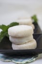 Lemon and Vanilla Shortbread Cookies Plated On Black Ceramic and Royalty Free Stock Photo