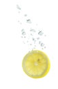 Lemon in water with air bubbles Royalty Free Stock Photo