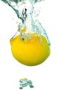 Lemon water splash with air bubbles Royalty Free Stock Photo