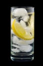 Lemon Wedge in Glass Mineral Water with Ice Royalty Free Stock Photo