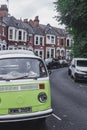 Lemon yellow Volkswagen Type 2 on a street in London