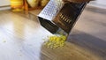 Lemon zest being grated,