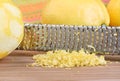 Lemon zest in macro with selective focus on zest. Royalty Free Stock Photo
