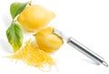 Lemon zest with zester. Royalty Free Stock Photo