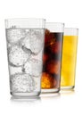 Lemonade drink with cola and orange soda with ice cubes on white background Royalty Free Stock Photo