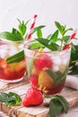 Lemonade with fresh strawberry, mint, lime and jam