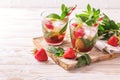 Lemonade with fresh strawberry, mint, lime and jam Royalty Free Stock Photo