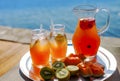 Lemonade and fruit on the beach Royalty Free Stock Photo