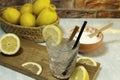 Lemonade glass and lemons basket Royalty Free Stock Photo