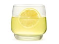 Lemonade in a glass with a slice of lemon fruit isolated on white Royalty Free Stock Photo