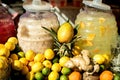 Lemonade and Horchata Jugs at a Fruit Stand