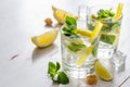 Lemonade ingredients on dwhite wood background