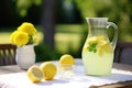 lemonade jug on an outdoor summer table