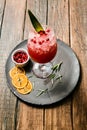 Lemonade or juice. Alcohol drink or cocktail. Images for bar or restaurant menu. Red drink with ice lemon and berries Royalty Free Stock Photo
