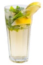 Lemonade with lemon slices and mint in a tall glass with ice. Royalty Free Stock Photo